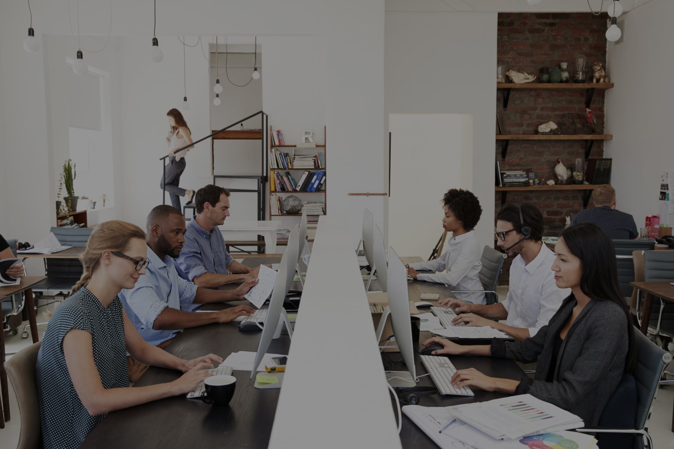 business-colleagues-working-at-a-busy-open-plan-of-2023-11-27-05-07-33-utc-min-scaled